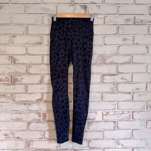 AllFenix Anthropologie blue black animal print leggings with pockets size small